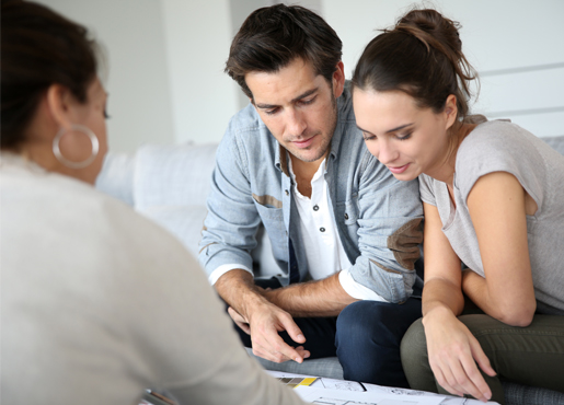 Couple looking over mortgage documents